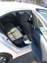 كورلة هايبرد موديل 2020 وارد امريكي حادثه جاملغات خلفيه فقط بدون اي اي...