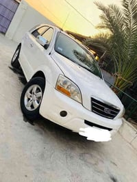 سورنتو 2008 بوليسي ابيض صدفي سياره نظيفه محرك جديد كير جديد تخم تاير ج...