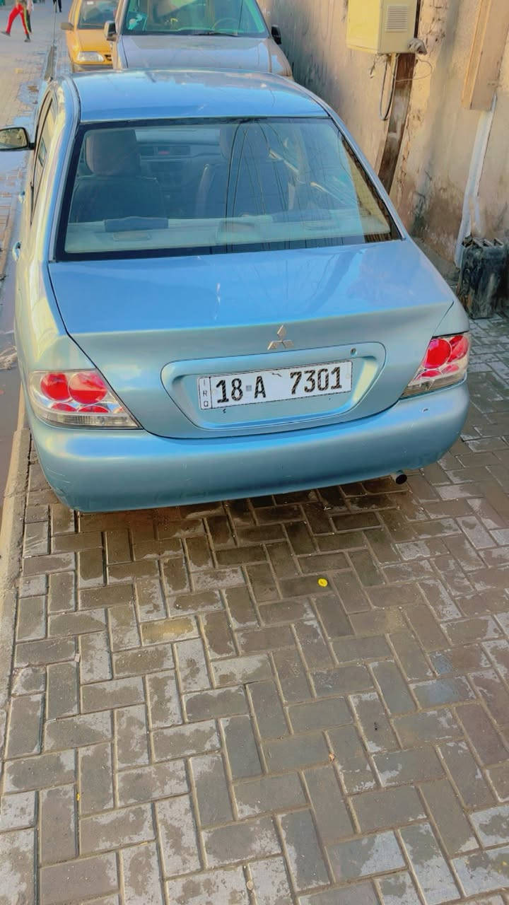 سلام عليكم لانسر ٢٠٠٥ مصبوغه عام ضربه بل جاملغ خلف الصدر بدون حض بدون دواخل كير محرك كفاله تبريد شغال 
سياره خير من الله سعر ٥٨ ورقه تجي تشوف سياره تعجبك وسهاله ***********مكان سياره بغداد كراده موجود كل الوقت وكفالة سياره من اي ضربه او عيب عده الي ذكرته
