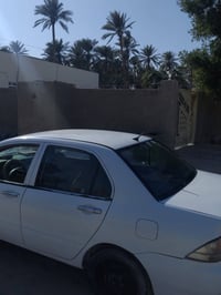 لانسر ٢٠١٠ • مكينة ١٦٠٠ • باسمي