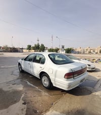 مكسيما ١٩٩٥ • مكينة كورلا • رقم انكليزي