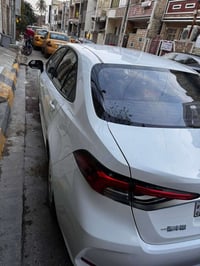 كورولا هايبرد موديل 2024  ماشية 18 الف الشكل الخليجي السيارة مكفولة من...