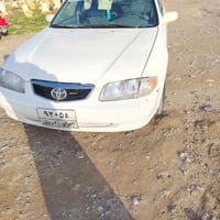 مازده موديل 2002كير محرك شرط  تبريد تدفئة تخم تاير جديد رقم أربيل تحوي...