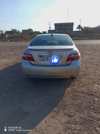 للبيع كامري موديل 2007 رقم بغداد محرك 2400 الاستفسار يم رقم 0782489604...