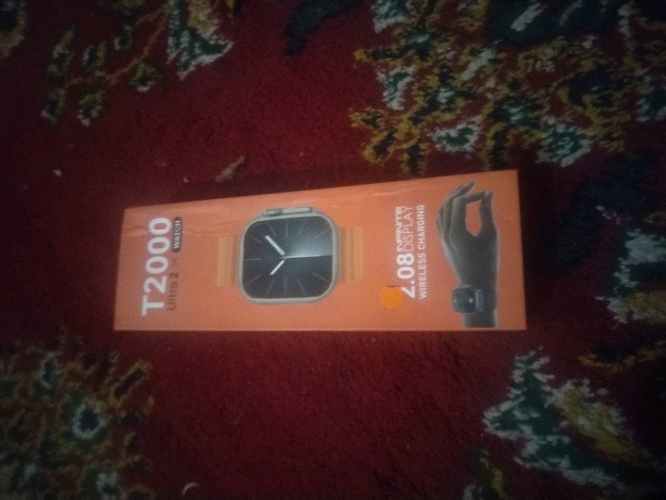ساعة T2000 Ultra 2، جديدة وغير مستعملة. تصميم أنيق وشاشة 2.08 إنش. تدعم الشحن اللاسلكي. مناسبة للرياضيين ولمتابعة الأنشطة اليومية. متوفرة بلون برتقالي جذاب ومقاومة للماء والغبار.