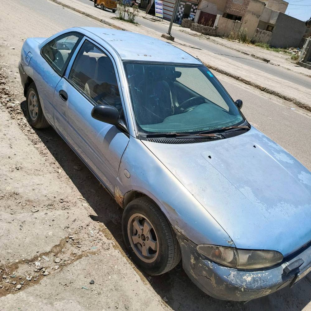 سياره مسيبوبوشي ميراج 1994 تك باب كير عادي كير محرك مكفولات غرفته نضيفه الكشر شوفة عين رقمه ديالى مكاني بغداد سبع البور***********
