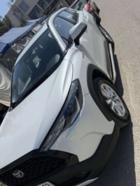 كورلا كروز 2024 مكفوله ماشية 27.000 كم، محرك 2000 هايبرد اقتصادي، رادا...