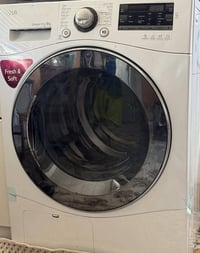 غسالة LG • 9 كيلو • غسالة ومجفف