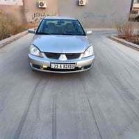 ميتسوبيشي لانسر • لانسر 2009 • محرك كبير • سيارة للبيع • رقم سليمانية ...