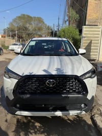 كورلا كروز 2025 ماشية 7k. الف  داخل جلد احمر واسود  فول مواصفات  كشن ك...