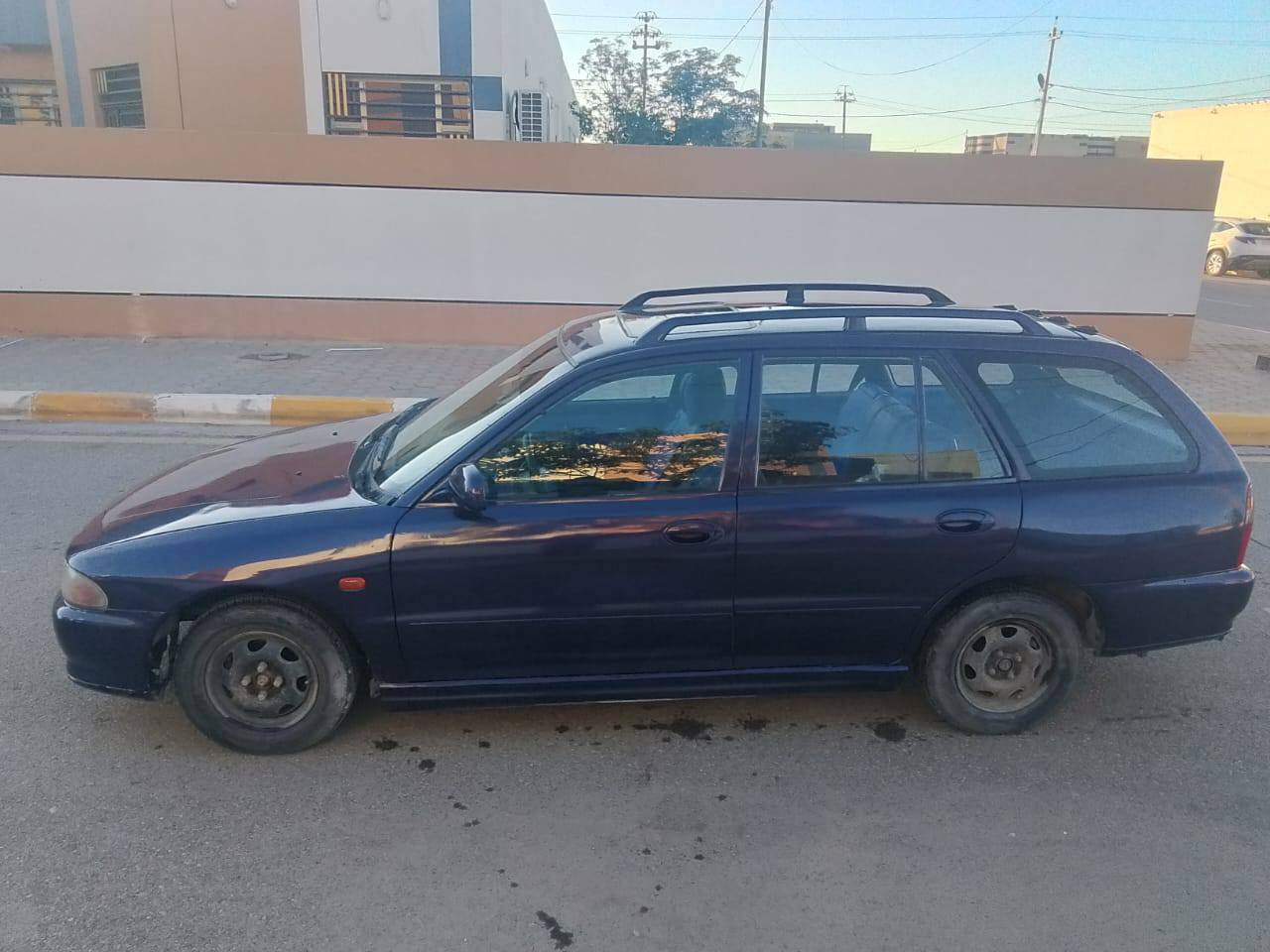 سلام عليكم لانسر ستيشن موديل 94 اوروبيه السياره كير و مكينه جديد تايرات نص عمر وصدر 75بل ميه ودوشمه وشاشه والسيارة مصبوغه عام للجماليه فقط والسيارة  شوفت عينك تجي اتكلب واتشوف سعره 36 وبيها مجال مكاني بغداد الامين الثانيه***********
