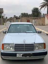 مرسيدس ١٩٩٠ • ابيض • محرك ٣٠٠٠