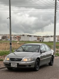 اوميغا • ١٩٩٥ • فول مواصفات