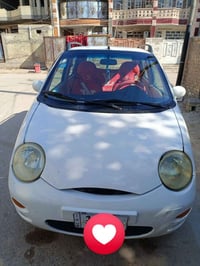 شيري QQ موديل 2012 لون ابيض للبيع رقم بغداد انكليزي + بأسمي تحويل ثاني...