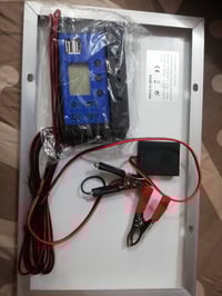 لوح شمسي • منظم شحن