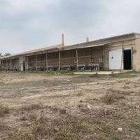 مخازن للايجار بغداد شارع القصر الاوسط 12 دونم تحتوي على 3 قاعات مخازن ...