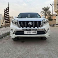 تيوتا برادو كويتي  موديل ٢٠١٤ لون ابيض  رقم بغداد الماني بسمي  ٦ سلندر...