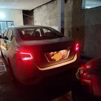 نيسان سنترا موديل ٢٥ رقم بغداد ابيض صدفي شاشه بلديه كامره مكينه 1600 ه...