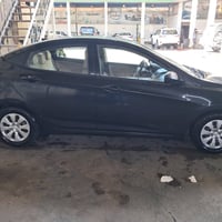 اكسند م ١٨ • ٥٢ الف • رقم بغداد