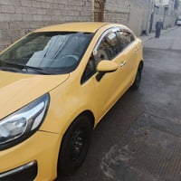 كيا ريو 2015 خليجي رقم بغداد السياره حلوه ونضيف صبغه ثانيه بيها بعض ال...