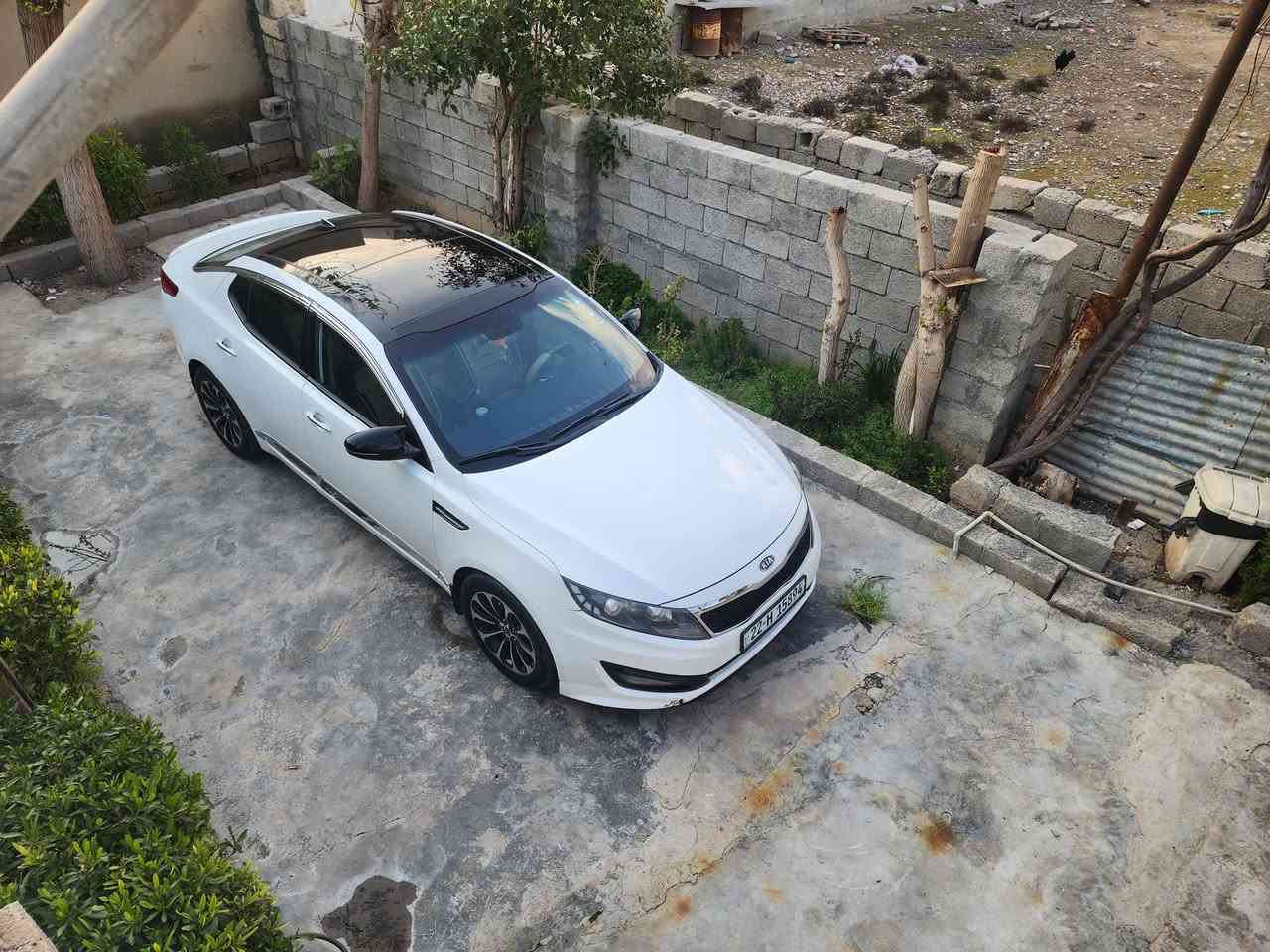 بداعي السفر كيا اوبتيما ٢٠١١ خليجي سياره بيها ثلاث قطع صبغ  كير ومحرك بيلادي ٢٤٠٠ دوش بشرط وللستفسار اكثر الرجاء الاتصال *********** والسياره موجوده باربيل
