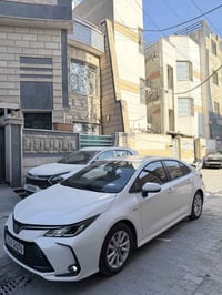 معروض للبيع🤍 كورولا موديل 2024 هايبرد ام العلامه السوده  رقم بغداد باس...