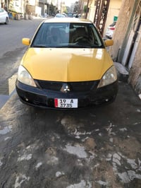 لانسر ٢٠٠٩ بيع او مراوس بخصوصي وانطي فرق السيارة خليجي لون رصاصي مصبوغ...