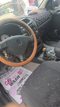 اوبل استرا موديل 2001 تحويل ثاني يوم السيارة مصبوغه للجماليه فقط السعر...