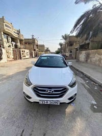 سياره توسان خليجي  موديل 2014 بسمي رقم بغداد  حداديتها  جديده أمامي خل...