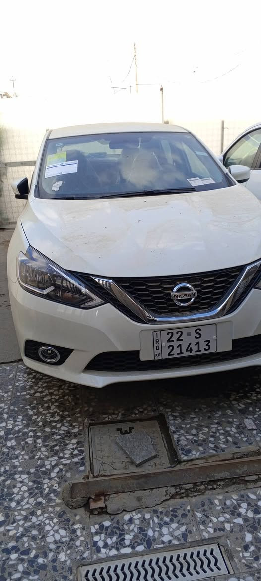 نيسان سنترا موديل 25زيرو رقم أربيل الجديد باسم شركة تحويل وكالة مجانا داخل مشمشي جلد  شاشة جنل للاتصال ***********
