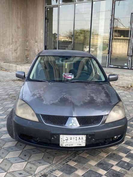 سلام عليكم لانسر ٢٠٠٩ خليجي السيارة مكفولة من كلشي عدة رصعات قليلة وجاملغ جهة السايق كير ومكينة كفالة وجواها تخم تاير وصدر مصار اسبوع من بدلتة وادامة كاملة للسيارة من كلشي وعليها منضومة زنون والسيارة خير من الله السعر ٧٥ وعليها غرامات اني اتحملها فقط المكان بغداد للاستفسار ***********
