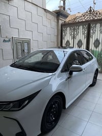 للبيع كورلا هايبرد 2024 الشكل الخليجي فول مواصفات  كير محرك تبريد دواخ...