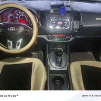 كيا سبوتيج موديل 2011 امريكي رقم بغداد/ظرر دعاميه أمامية وشويه من جامل...