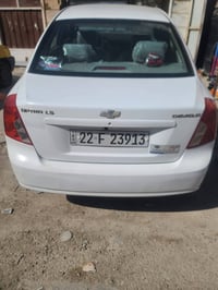 اوبترا موديل 12 كير عادي رقم شمالي سيارة بيه صبغ نص جاملغ ونص باب سيار...