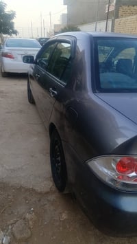 لانسر • ٢٠٠الف • كفاله عامه