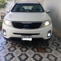 السعر🛑 148🛑 للاستفسار 07777587172  سورنتو 2015 بسمي لون ابيض أمريكي رق...