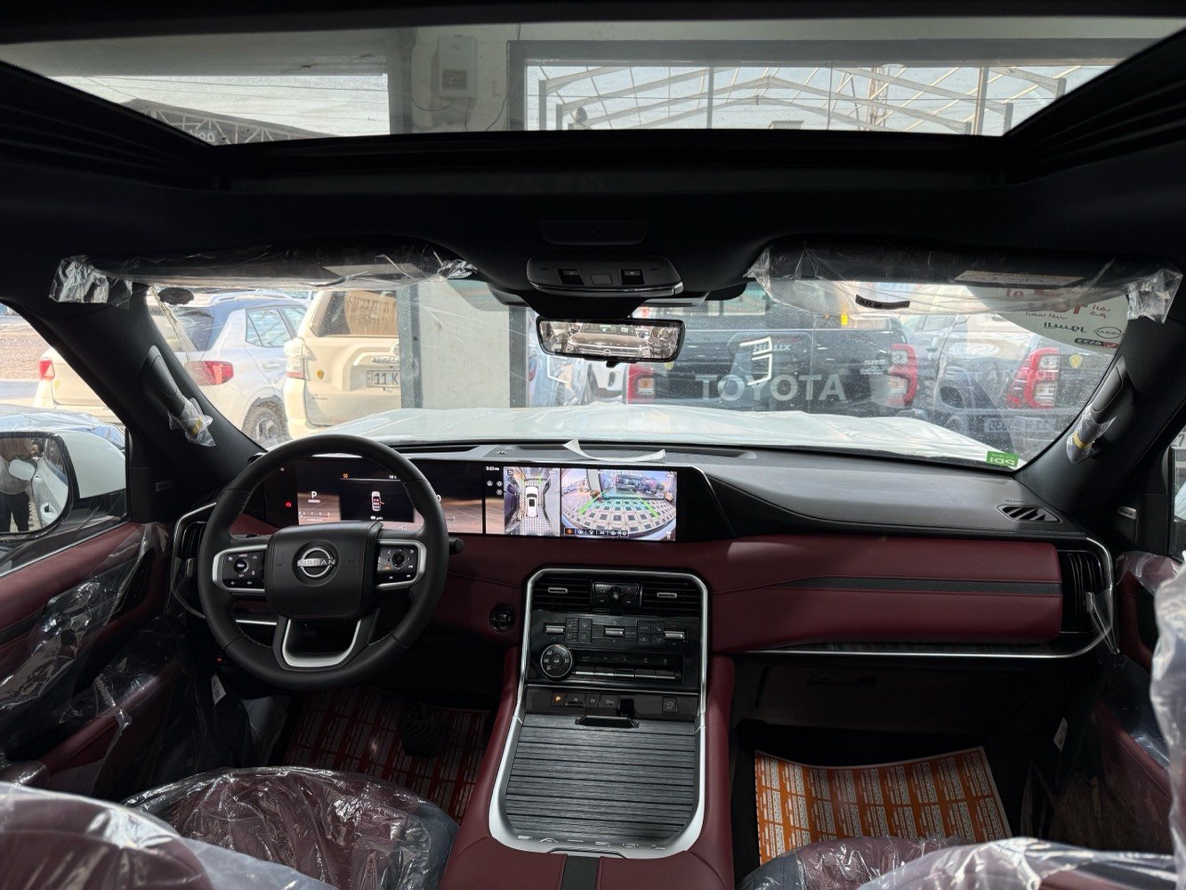 بلاتينيوم ابيض 2026 رقم بغداد بانوراما رادار تحديد مسار قيادة ذاتية نقطة عمياء داتا شو عرض على الزجاج كراسي مساج وكهرباء وتدفئة وتبريد وذاكرة محرك 6 سلندر تنفس طبيعي داخل احمر فور ويل و5 كامرات وشاشة كبيرة متصلة وشاشات خلفية وجنطه كهرباء والكراسي الاخيرة كهرباء 