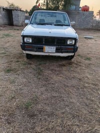 نيسان بيكم موديل 91  للبيع رقم واسط سعرها 40وبيها مجال 07804036681