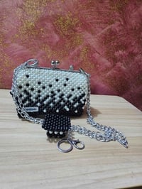 جنطة • مكس ليلو • مدالية هدية