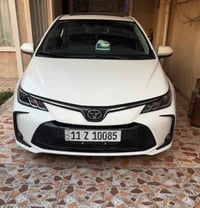 كورلا هايبرد 2025  ماشية 28 الف رقم بغداد  كفالة عامة من كلشي  داخل جل...