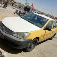 لانسر 2010 حلوه اوكاعده محرك بي بخار السعر ب50   مكان السياره حي اور ق...