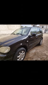 مارسدس ML للبيع او مراوس  رقم بغداد محرك 8 سلندر مكينه 500 سياره رايده...