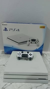 بلي ستيشن 4 pro  مهكر الهارد  1 تيرا(1000كيكا)،  معا جوستيك 2 ( يدتين ...