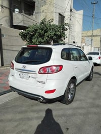 هونداي سنتافيا 2012 الشركه العامه للسيارات فور ويل  سبعه راكب  رقم بغد...