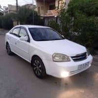 اوبترا 2011 السياره بيها صبغ كم قطعه ابيع احزام كير ومحرك مكفولات تبري...