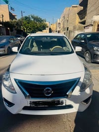 نيسان سني هندي ٢٠٢٣ خليجي فول مواصفات ١/١  رقم بغداد باسمي  بصمة  تبري...