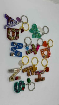 مداليات حروف • مصنوعة من الرزن