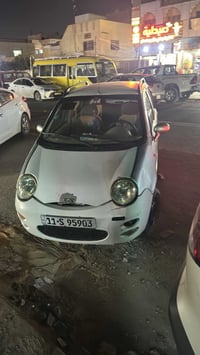 كيو كيو 2013للبيع كير مكينه وكشر نضيف السعر٢٤ مكان السيارة بغداد الشعب...