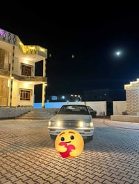 سيدان ابيض • محرك 2500 • موديل 90