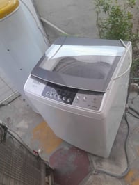 غسالة اوتماتيك • نضيفة • زعفرانية سعيدة